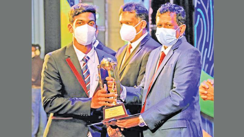 Flashback - Best All-Rounder Division III Hashen Lalindra Fernando of Loyala College, Negombo receives his award presented by Senior Deputy General Manager ANCL Kamal Wijesuriya at the 43rd mega show held last December