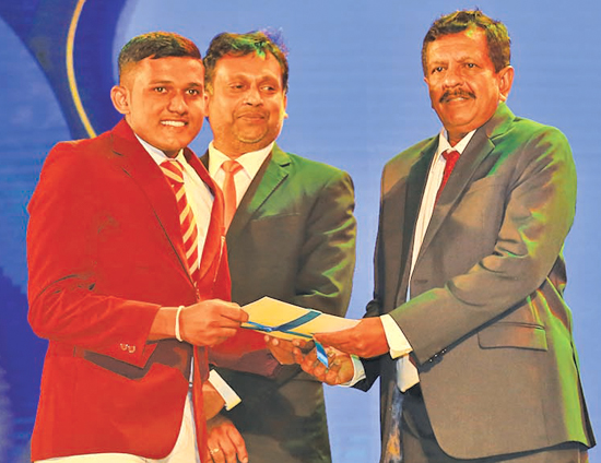 Division Three - Best All-rounder - Runners up - Shakthi Udara Jayathilake of Rajasinghe Central College, Hanwella receives his Award from Senior Deputy General Manager ANCL, Kamal Wijesuriya