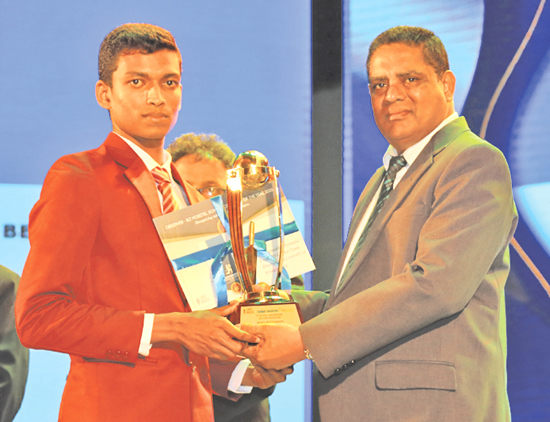 Awards Best  Bowler - Division Three - Runner up Venuk Dilwan Hettiarachchi of Ananda Shasthralaya, Kotte receives the Award from Deputy General Manager/Finance ANCL, Virajith Bois
