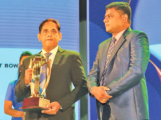 National Award Best Bowler  -  Dilshan Madhusanka of Vijayaba National School, Hungama presented by ANCL Managing Editor of Government Relations Department Samantha Karunasekera