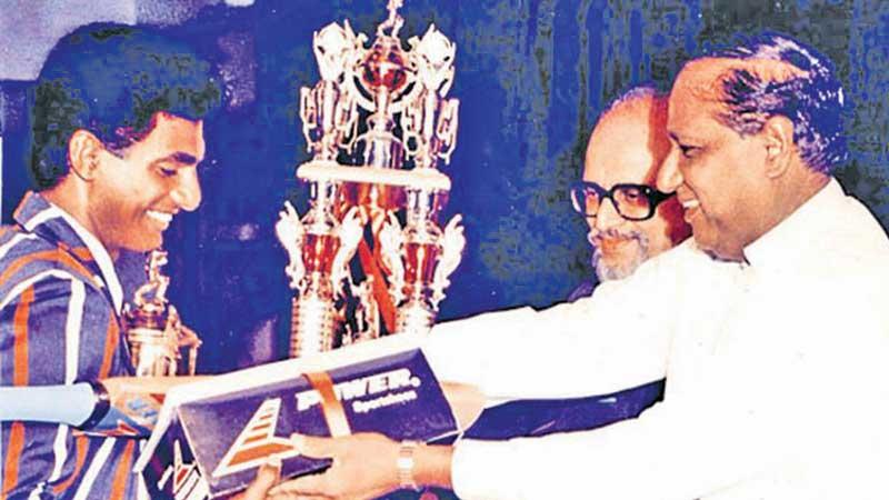 Flashback 30 years ago: Muttiah Muralidaran of St. Anthony’s College, Katugastota receiving the Observer Schoolboy Cricketer of the Year 1991 title from then Housing and Construction Minister, the late B. Sirisena Cooray watched by then Editor-in-Chief of Sunday Observer H.L.D. Mahindapala