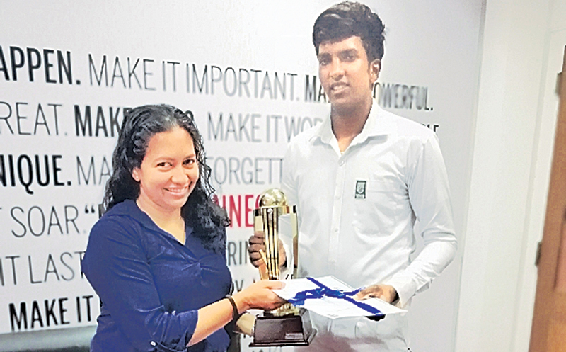 The Best All-rounder in the Div. III category Mithila Poornajith accepts his Award from Madara de Mel the Deputy General Manager Branding and Communications of Lake House.