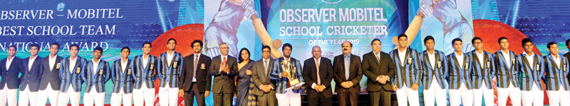 Cricketers from S. Thomas’ College Mount Lavinia pose with their prize as the Best team at the Sunday Observer-Mobitel Schoolboy Cricketer Awards held at the Hilton Hotel in Colombo on Friday night in the company of Chief Guest Aravinda de Silva, P.G. Kumarasinghe (Chairman SLT, Mobitel), Krishantha Cooray (Chairman ANCL) and Nalin Perera (CEO Mobitel) 