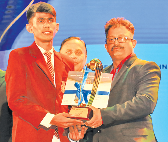 Division Three Best Fielder Sachin Dilhara of Madampa MMV Ambalangoda receives his award from Deputy General Manager Corporate Affairs ANCL Chandana Bandara