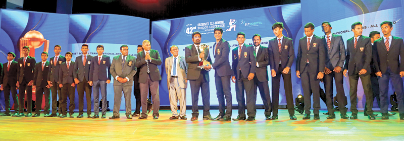 Best schoolboy team 2020 (all island) Trinity College Kandy receive their trophy presented by guest of honour, Minister of Information and Media Keheliya Rambukwella in the presence of ANCL Chairman W. Dayaratne PC (Pix: Sudath Malaweera)