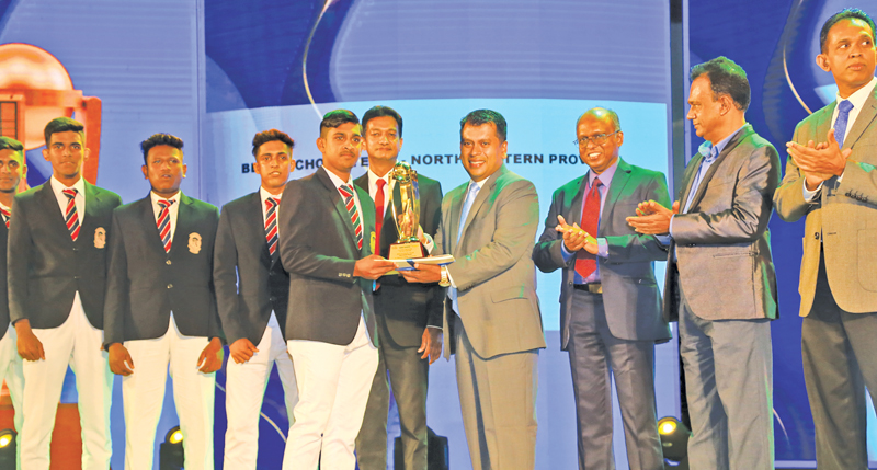 Captain of the Best School Team of the North Western Province St. Sebastian’s College, Katuneriya is presented with their award given by ANCL Director Legal and Administration, Rakhitha Abeygunawardhana