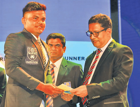 Division one - Best Bowler - Runner- up Lohan Aroshana de Zoysa of Dharmasoka College, Ambalangoda recieves award from Chanaka Liyanage Manager Channel Publicity of ANCL