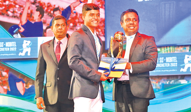 National Award Best Bowler - Dunith Wellalage of St. Joseph’s College, Colombo receiving the award from President of SL Umpires Association, Premanath C Dolawatte MP