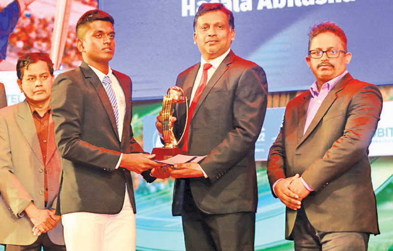 Division Three best wicketkeeper - Tier A. A trophy and cash award to Hasala Abhilasha of Deberawewa National School, Hambantantota presented by previous Deputy General Advertising ANCL Prasanna Jayasundra