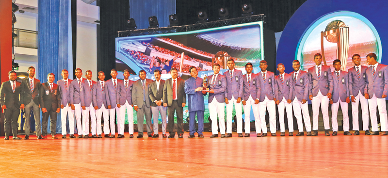 Southern Province runner up team of the year 2022 Richmond College, Galle receiving their Award from the Guest of Honour Transport, Highways and Mass Media Minister Dr. Bandula Gunawardena. Editor-in-Chief of Sunday Observer Dinesh Weerawansa, SLT-Mobitel Chief Marketing Officer Prabahath Dahanayake and Media Ministry Secretary and Lake House Chairman Anusha Palpita  are also in the picture