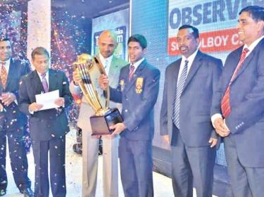 Flashback: Niroshan Dickwella of Trinity College (Schoolboy Cricketer of the Year 2012) receives his award from Chief Guest Marvan Atapattu. Also in the picture are Dinesh Weerawansa (Editor in Chief Sunday Observer), ANCL Chairman Bandula Padmakumara, Sports Minister Mahindananda Aluthgamage and SLT, Mobitel CEO Lalith de Silva