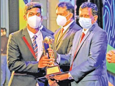 Flashback - Best All-Rounder Division III Hashen Lalindra Fernando of Loyala College, Negombo receives his award presented by Senior Deputy General Manager ANCL Kamal Wijesuriya at the 43rd mega show held last December