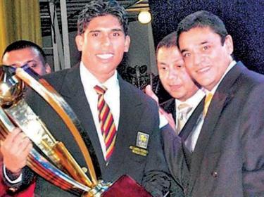 Flashback: Umesh Karunaratne winning the Observer Mobitel Schoolboy Cricketer of the Year trophy from the first ever winner and ICC Chief Match Referee Ranjan Madugalle